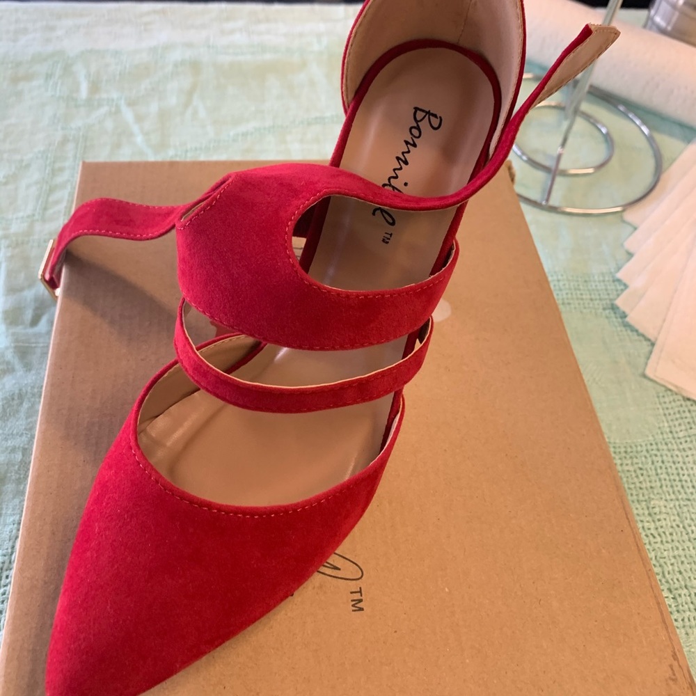 Red suede like high heels